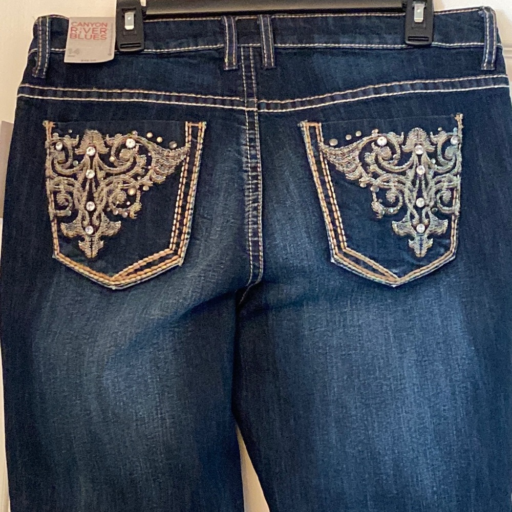 Jeans with rhinestone detailed pockets!!